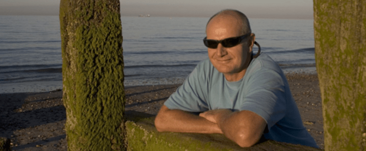 Richard Attree, author photo, on the beach in Soreham-by-Sea
